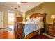 Spacious bedroom with wooden furniture, stylish bedding, and ample space for relaxation and rest at 3509 Battersea Ct, Belle Isle, FL 32812