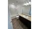 Bathroom featuring a single vanity, toilet, and tub-shower combination at 366 Madison Dr, Davenport, FL 33837