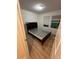 Bedroom with wood-look flooring and two windows at 366 Madison Dr, Davenport, FL 33837