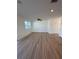 Spacious living area featuring hardwood floors and ample natural light at 366 Madison Dr, Davenport, FL 33837