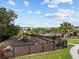 Community playground area with slides and green space on a sunny day at 366 Madison Dr, Davenport, FL 33837