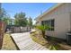 Landscaped backyard with a wooden walkway leading to a pool at 387 Kantor Blvd, Casselberry, FL 32707
