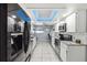 Modern kitchen with stainless steel appliances, white cabinetry, and recessed lighting at 387 Kantor Blvd, Casselberry, FL 32707