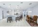 Bright, airy kitchen features a breakfast bar, modern appliances, and pendant lighting at 4008 Lakeside Reserve Ct, Orlando, FL 32810