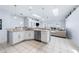 Open-concept living area with views into the kitchen and comfortable seating at 4008 Lakeside Reserve Ct, Orlando, FL 32810