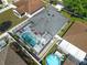 Aerial view of a screened-in pool and patio area, ideal for relaxation and outdoor entertainment at 4008 Lakeside Reserve Ct, Orlando, FL 32810