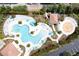 Aerial view of the resort pool area with ample seating and lush landscaping at 4126 Breakview Dr # 40901, Orlando, FL 32819