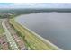 Stunning aerial view of a lakeside community offering beautiful waterfront properties at 424 Lazio Cir, Debary, FL 32713