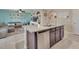 Open concept kitchen with granite countertops, stainless steel dishwasher, and access to the living room at 424 Lazio Cir, Debary, FL 32713