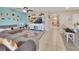 Open concept living space featuring a kitchen, dining area, and a comfortable living room at 424 Lazio Cir, Debary, FL 32713