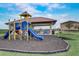 A colorful playground and covered picnic area for residents in the community at 424 Lazio Cir, Debary, FL 32713