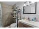Updated bathroom with tile shower, modern vanity and sleek fixtures at 4274 Tatum St, Orlando, FL 32811