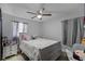 Bedroom featuring neutral colors, a ceiling fan and wood-look floors at 4274 Tatum St, Orlando, FL 32811