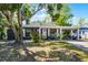 Charming single story home with mature trees and a covered carport at 4274 Tatum St, Orlando, FL 32811