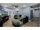 Comfortable living room with wood-look floors and light blue walls at 4274 Tatum St, Orlando, FL 32811