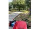 Large backyard with mature trees offers privacy and ample space at 434 Diamond Acres Rd, Davenport, FL 33837