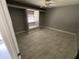 Bedroom with tile floors and closet space at 434 Diamond Acres Rd, Davenport, FL 33837