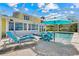 Relax by the sparkling pool and spa, complete with lounge chairs and waterfront views at 5224 Saint Regis Pl, Belle Isle, FL 32812