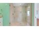 Bathroom featuring a large glass-enclosed shower with dual showerheads at 5224 Saint Regis Pl, Belle Isle, FL 32812