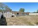Expansive backyard, complete with storage shed, offers endless possibilities for outdoor enjoyment at 525 E Foothill Way, Casselberry, FL 32707