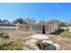 Backyard with patio provides ample space for outdoor entertaining and relaxation at 525 E Foothill Way, Casselberry, FL 32707