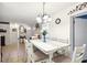 Bright dining room featuring a chandelier and table with seating at 525 E Foothill Way, Casselberry, FL 32707