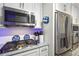 This modern kitchen offers stainless steel appliances and a gas range for efficient cooking at 525 E Foothill Way, Casselberry, FL 32707
