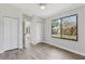 Bedroom with plenty of storage closets, neutral colors, and a view of the backyard at 525 Legume Dr, Port Orange, FL 32127