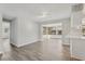 Bright living room area with lots of windows, light gray paint and wood-look floors at 525 Legume Dr, Port Orange, FL 32127