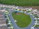 Aerial view of a playground in a neighborhood at 543 Pine Tree Bridge Trl, St Cloud, FL 34772
