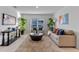 Comfortable living room features bright natural light and stylish decor at 543 Pine Tree Bridge Trl, St Cloud, FL 34772