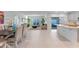 Bright and open living area with dining and living spaces, perfect for entertaining and relaxation at 543 Pine Tree Bridge Trl, St Cloud, FL 34772