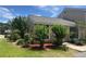 Well-maintained home exterior with manicured lawn and mature landscaping in a tranquil neighborhood at 601 Casa Park Court B Ct, Winter Springs, FL 32708
