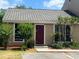 Charming home featuring a beautiful front door, well-maintained landscaping, and a welcoming entrance at 601 Casa Park Court B Ct, Winter Springs, FL 32708