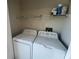 Laundry room featuring a white washer and dryer at 601 Casa Park Court B Ct, Winter Springs, FL 32708