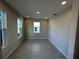 Bright living room with modern floors and recessed lighting at 620 Pothos St, Apopka, FL 32703