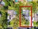 Expansive aerial view of the home showcasing the pool, mature trees, and well-maintained landscaping at 687 Saranac Dr, Winter Springs, FL 32708