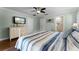 Bedroom with a TV and closet and bathroom in view at 687 Saranac Dr, Winter Springs, FL 32708