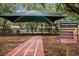 Outdoor fitness zone featuring exercise equipment, shade, and a running track at 687 Saranac Dr, Winter Springs, FL 32708