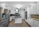 Bright kitchen with stainless steel appliances, granite countertops, and ample cabinet space at 687 Saranac Dr, Winter Springs, FL 32708