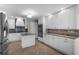 Well-appointed kitchen with stainless steel appliances, double oven, and tile backsplash at 687 Saranac Dr, Winter Springs, FL 32708