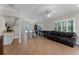 Bright living room with tiled flooring, ceiling fan, recessed lights, and comfortable seating arrangement at 687 Saranac Dr, Winter Springs, FL 32708