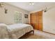 Spare bedroom with hard wood wardrobe, decorative wall art and window to the outside at 745 Oak Ln, Orange City, FL 32763