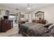 Bedroom showcasing access to the lanai and dark wood furniture at 745 Oak Ln, Orange City, FL 32763