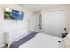 Modern bedroom with television, closet and plenty of natural light at 7803 Laurel Oak Ln, Kissimmee, FL 34747