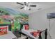 Charming bedroom with Mickey Mouse themed decor and two twin beds at 8471 Secret Key Cv, Kissimmee, FL 34747