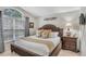 Bedroom showcasing a large window, and stylish decor at 8471 Secret Key Cv, Kissimmee, FL 34747