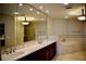 Bright bathroom with double vanity, garden tub, and shower at 8761 The Esplanade # 6, Orlando, FL 32836