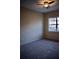 Cozy bedroom featuring soft carpet, neutral walls, and a bright window, creating a comfortable and inviting space at 8761 The Esplanade # 6, Orlando, FL 32836