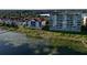 Waterfront condos with private balconies offer stunning views and convenient access to the lake at 8761 The Esplanade # 6, Orlando, FL 32836